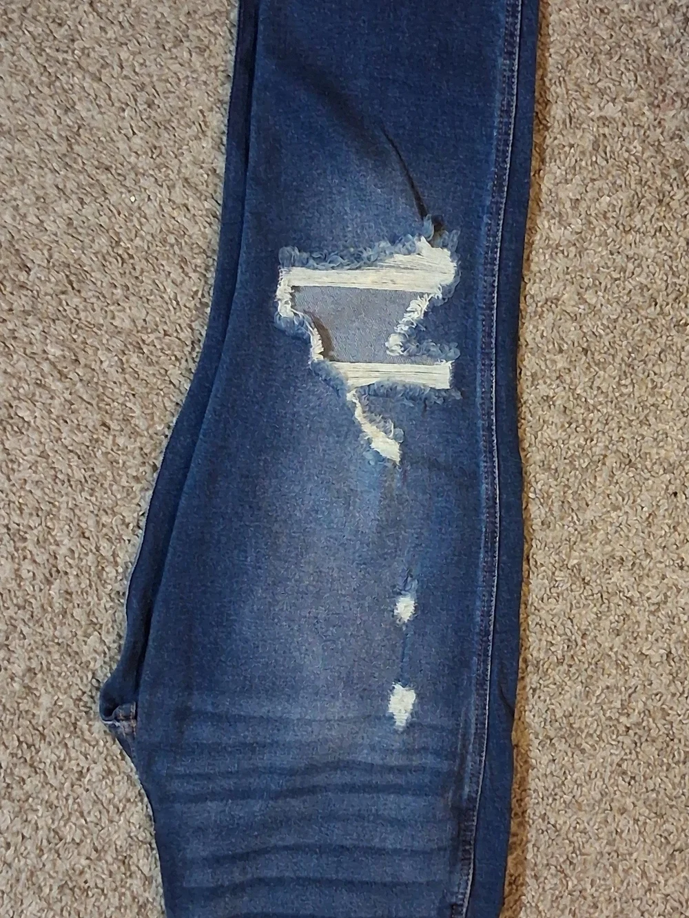 Women's Distressed Blue Jeans